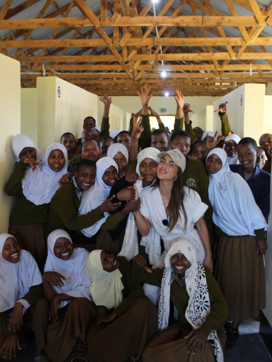 Camila Coelho visiting So They Can in Tanzania